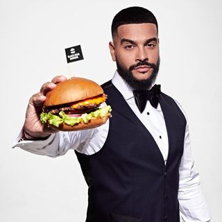 Тимати с бургером из Black Star Burger. Фото из Instagram: @blackstarburger